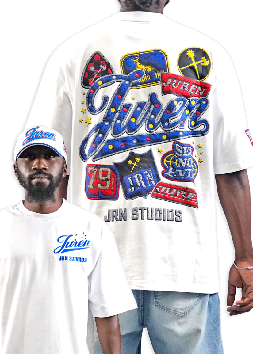 A man modeling a white graphic T-shirt, showing both the front and back views. The back features a large, colorful patchwork-style graphic with the word 'Juren' in blue script, red banners, and blue stars.