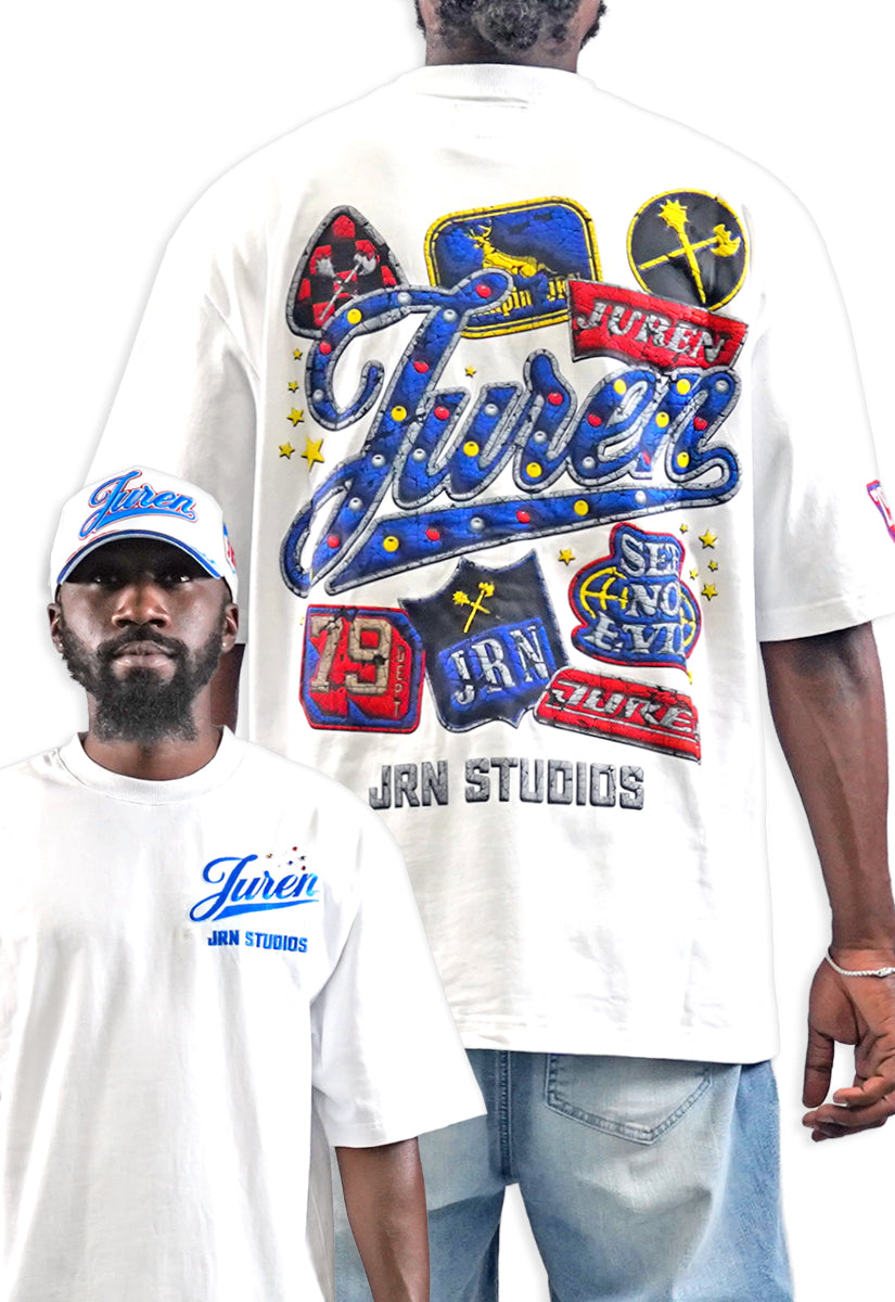 A man modeling a white graphic T-shirt, showing both the front and back views. The back features a large, colorful patchwork-style graphic with the word 'Juren' in blue script, red banners, and blue stars.