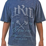Man wearing a blue acid wash graphic t-shirt with text and design elements.