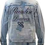 Light blue denim jacket with 'Paradise Dreams' text and butterfly designs on a white background