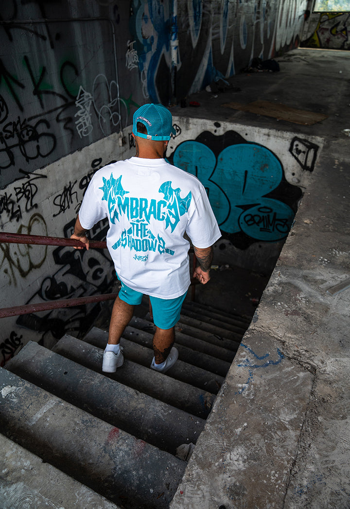 Embrace The Shadows Heavyweight Tee, Raw Edge Shorts, and Trucker Hat Combo