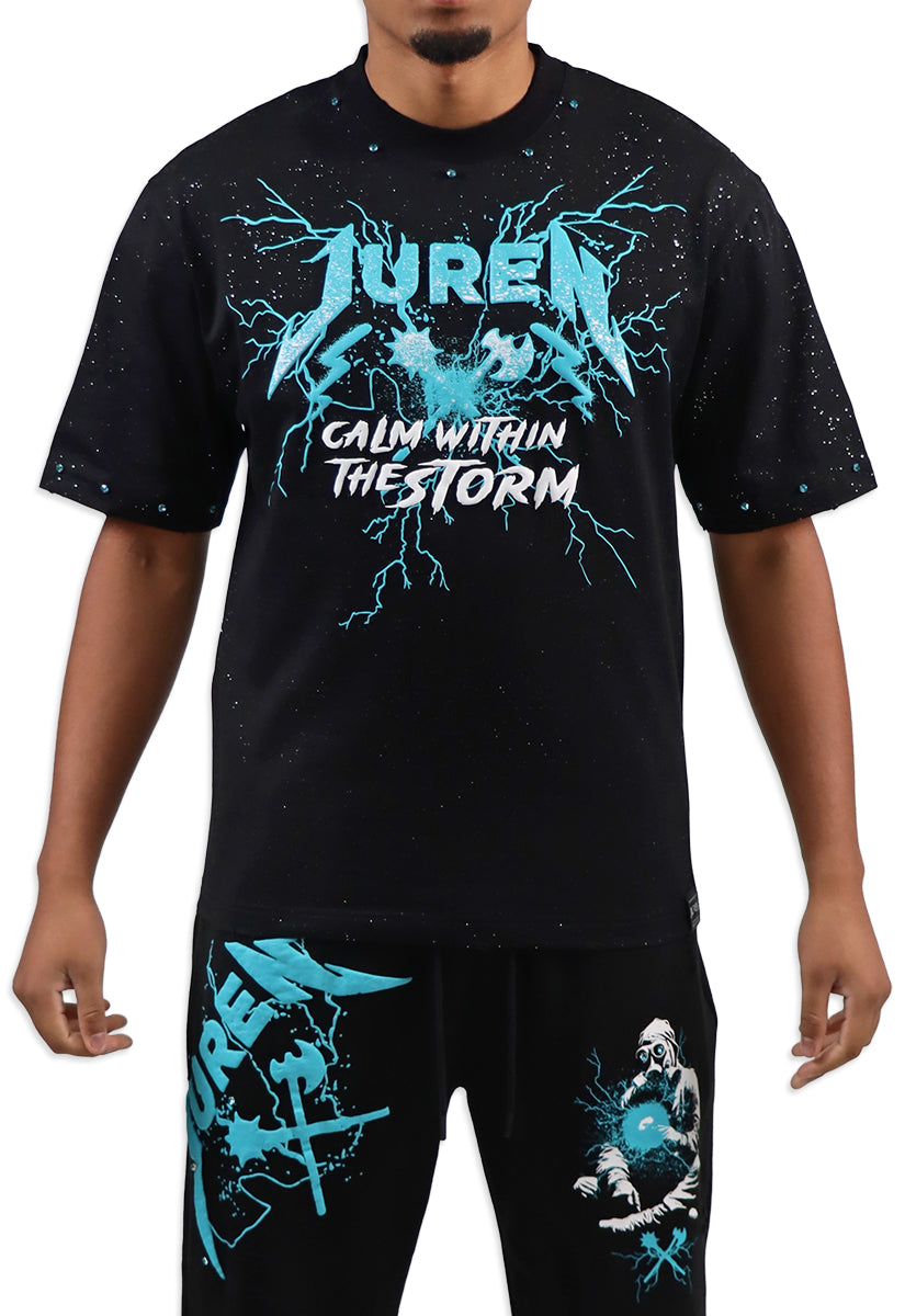 Black t-shirt with teal and white graphics and  bottom text on a white.