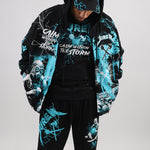 Person wearing a black hoodie with teal and white graphics and text, including the brand 'Juren'.