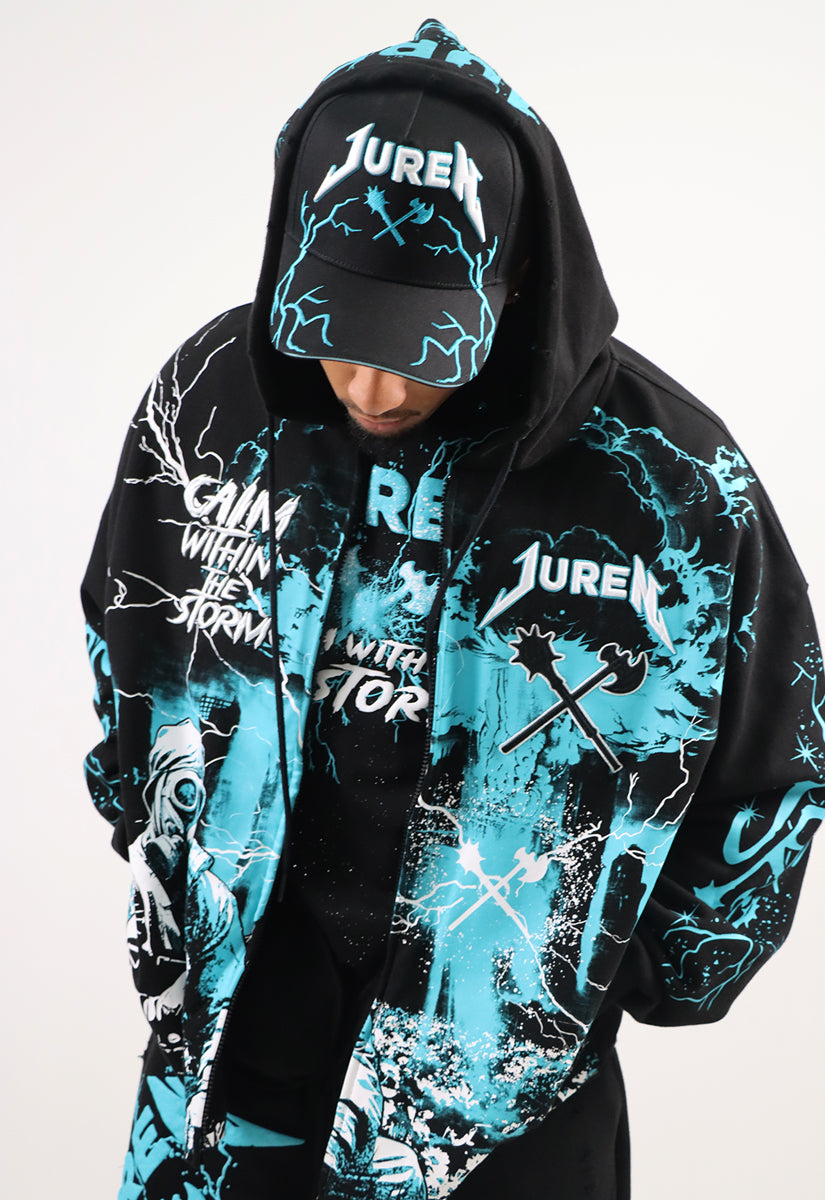 Person wearing a black hoodie with teal and white graphics and text, including the brand 'Juren'.