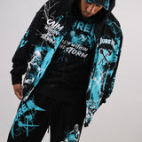 CALM WITHIN THE STORM ZIPPER HOODIE