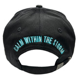 Black cap with 'Juren' logo in white and teal puff embroidered and teal lightning on visor