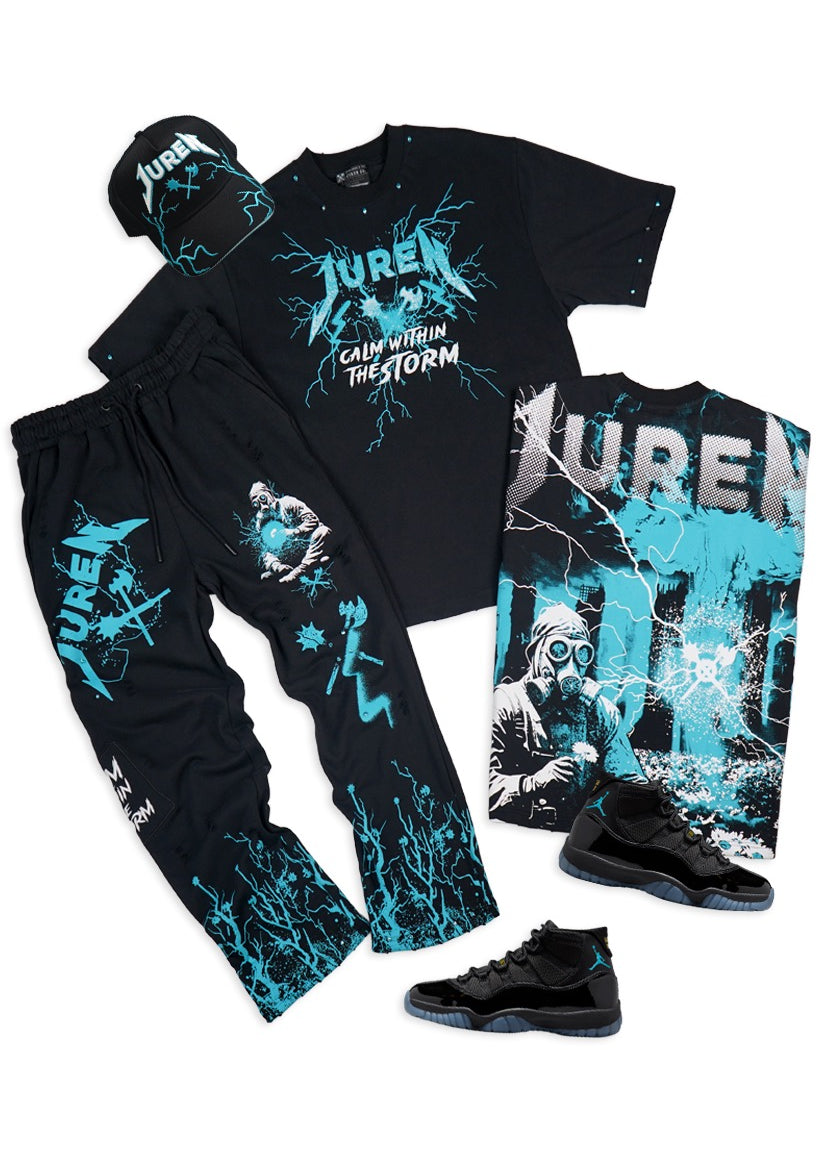 Black Outfit with shirt, sweat pants and Trucker hat.