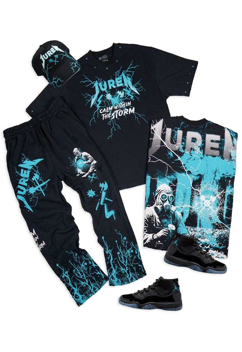 Black Outfit with shirt, sweat pants and Trucker hat.